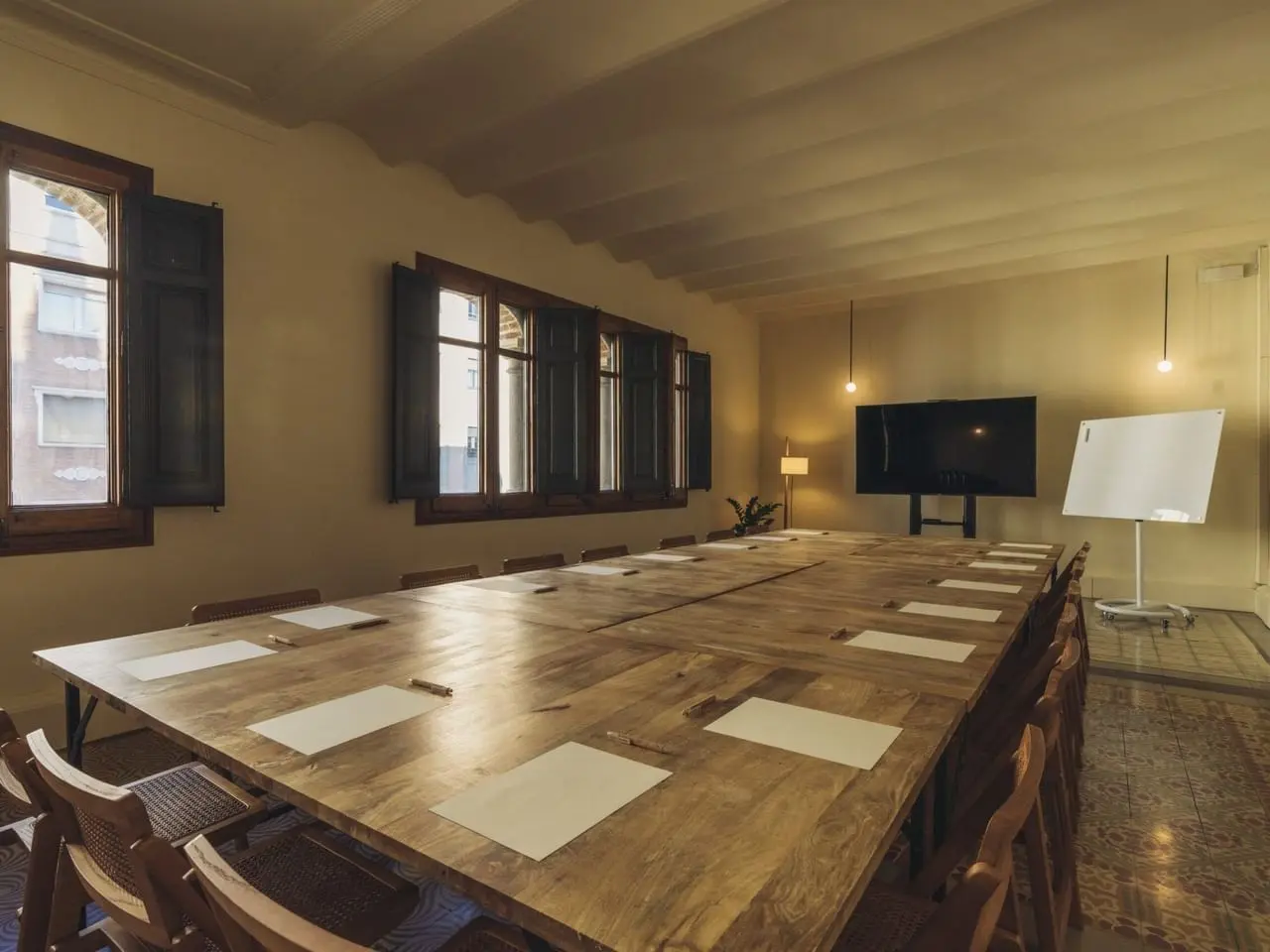 private office with ergonomic chairs and meeting room in barcelona